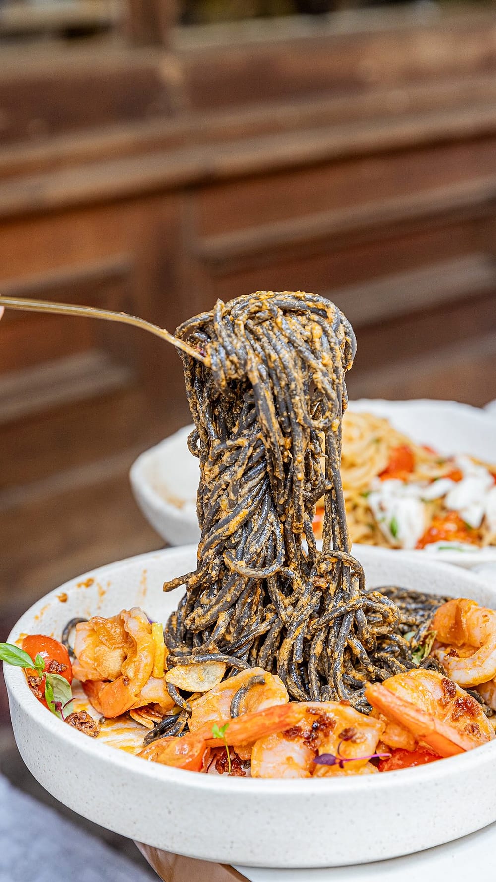 Squid ink spaghetti with seafood, a Two Sis & Co signature