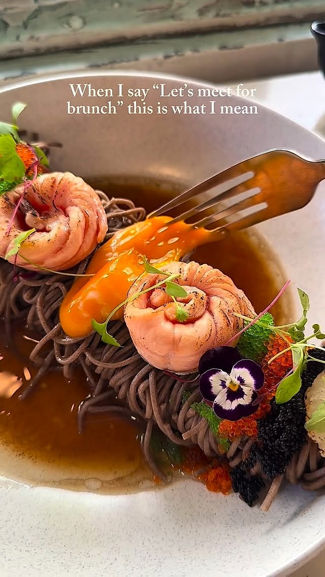 Squid ink noodles with a salmon rose