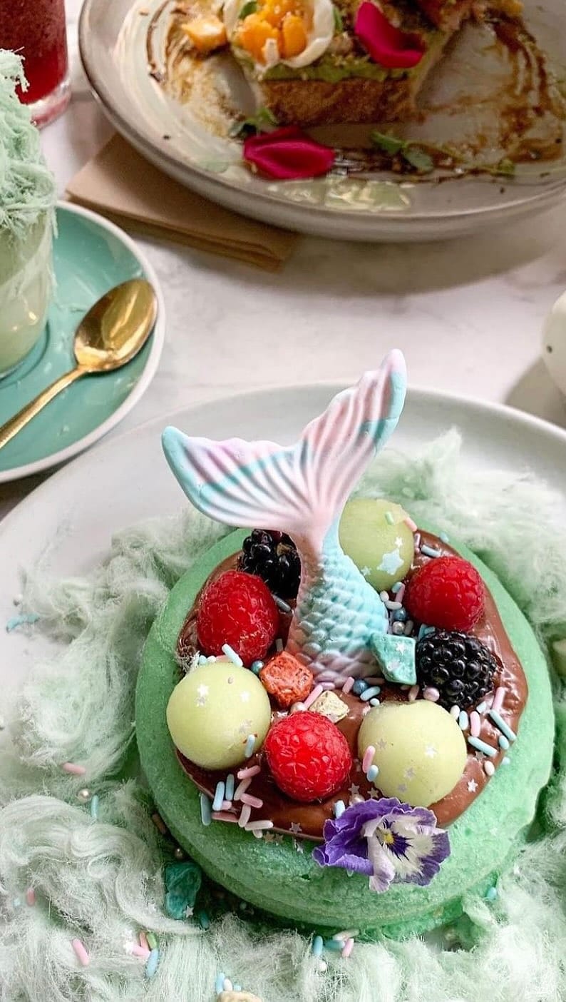 The mermaid tail dessert with berries